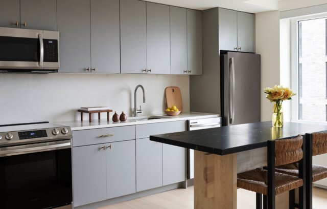 Open kitchen and island at Estela apartments in South Bronx